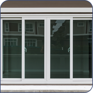 Modern white sliding glass doors reflecting suburban homes